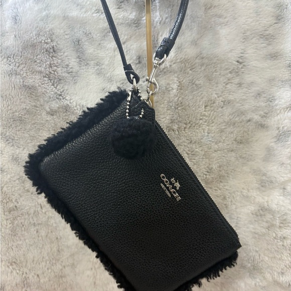 Coach Black Pebbled Leather and Shearling trimmed Wristlet Pouch. Hangtag Boxed